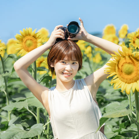 女性カメラマン